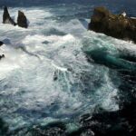 Incredible location for a lighthouse perched on a rock in Iceland’s wild surf