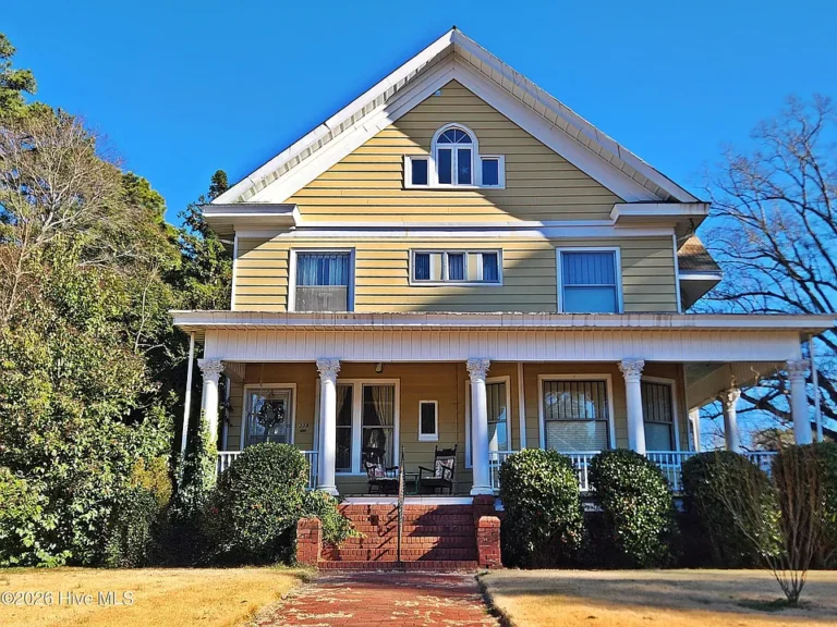 Wrap-around porch and over 2 acres! C. 1910 in North Carolina. $305,000.