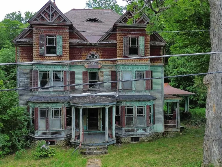 Check out that staircase! Grand c. 1870 Victorian in Maine. $50,000.