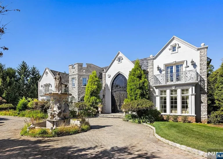 Check out those 22-foot ceilings! Designer mansion with an indoor squash court in New Jersey. $4,799,000.