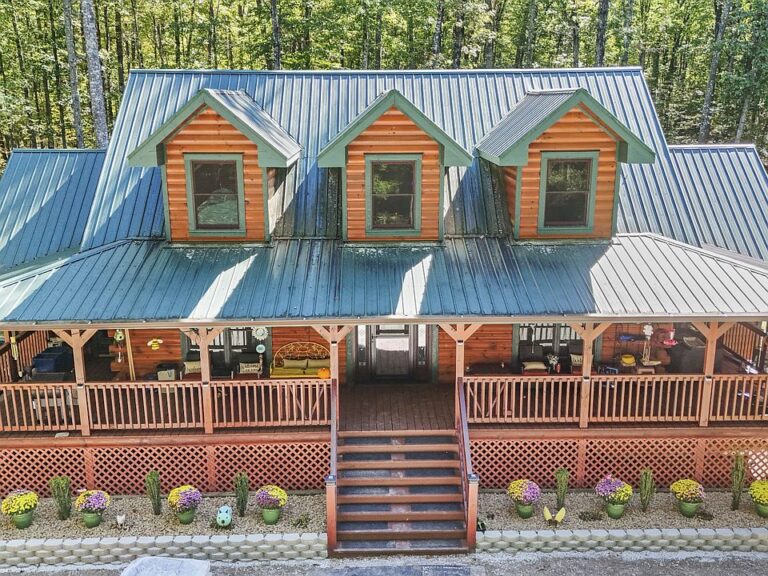 Great mountain getaway! Custom log home on 6.86 private acres. $594,900.