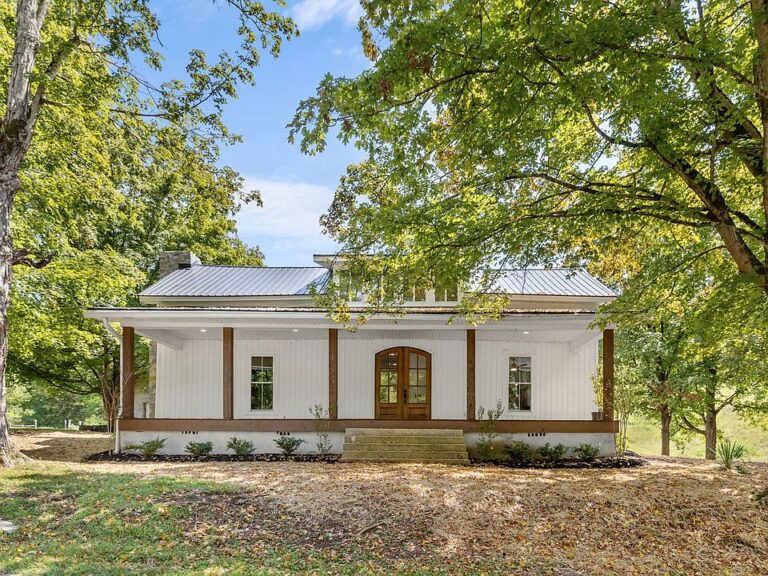 Original logs and modern charm! 13 rolling acres in Tennessee. $585,000.