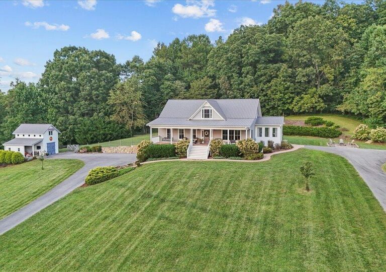 Beautiful vaulted ceilings! Private acreage with water views in TN. $881,000.