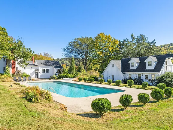 Check out that pool!! Historic 1900s estate on 30+ acres in Eagleville. $5,149,000.