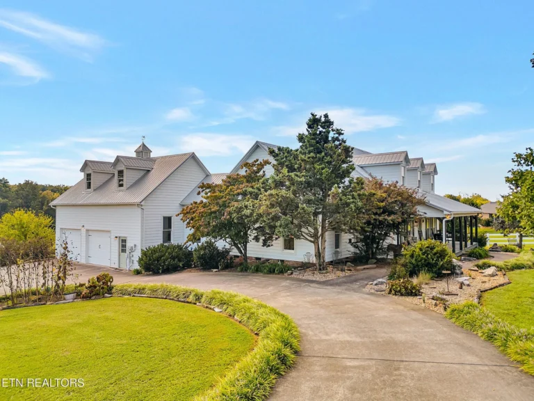 Beautiful woodwork! Great barn! C. 2002 in Friendsville. $1,280,000.
