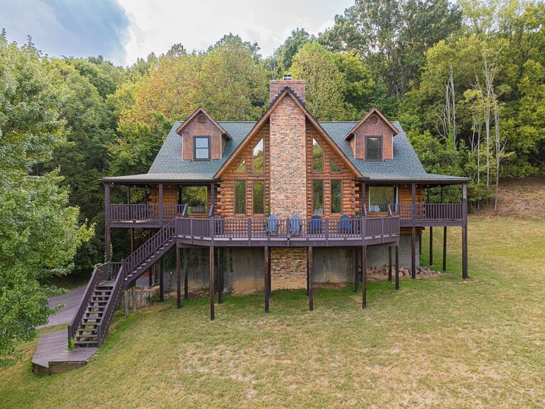 Check out the stone fireplace! Log-built beauty in Nolensville. $1,150,000.