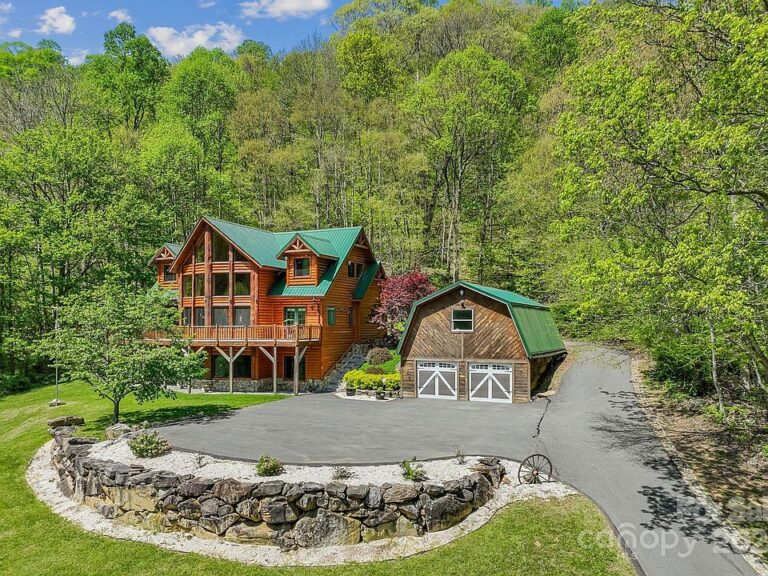 Check out those windows!! Modern mountain masterpiece on 13 acres in NC. $1,250,000.