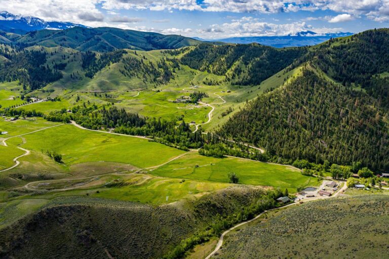 Pretty setting and views! 58-acre mountain ranch in North Fork. $2,800,000.