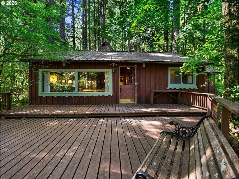 Pretty wood beams and river views! Classic mountain getaway in Oregon. $350,000.
