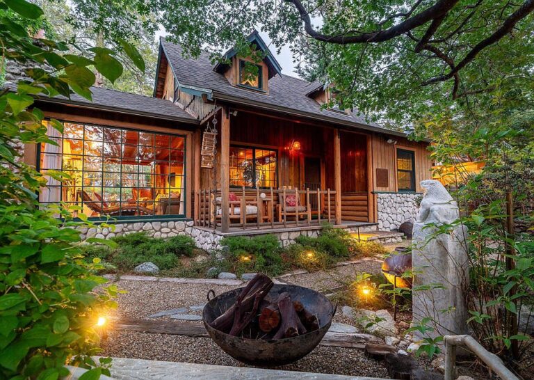 Great mountain getaway! C. 1946 with floor-to-ceiling windows. $649,000.