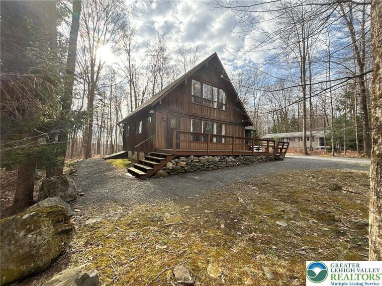Check out the deck! Perfect mountain retreat on half an acre. $289,900.