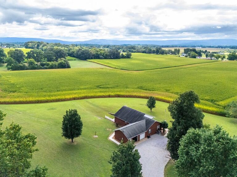 Check out the front porch! 77 rolling acres in Tennessee. $1,650,000.