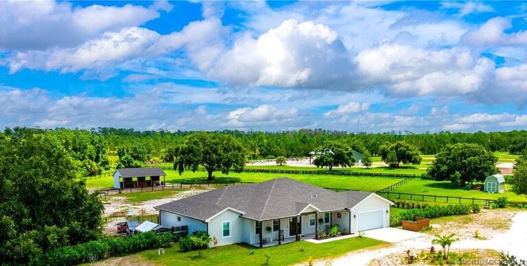 Check out the barn!! 10+ fenced acres in Okeechobee. $899,000.