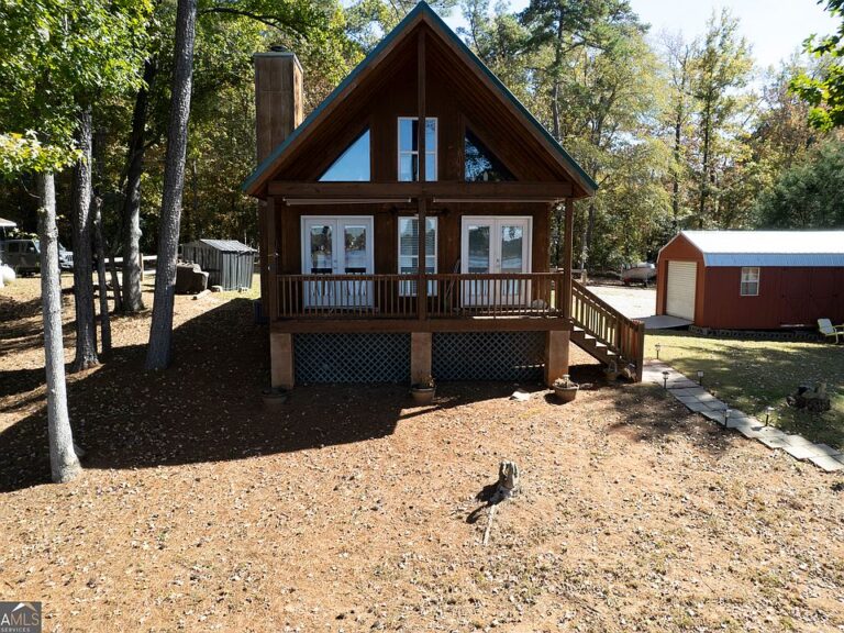 Beautiful lake views! C. 2018 A-Frame in Sparta. $499,900.