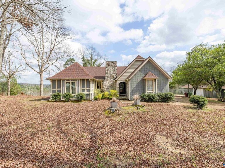 Beautiful stone details! Spacious shop and 1.5 acres in Alabama. $280,000.