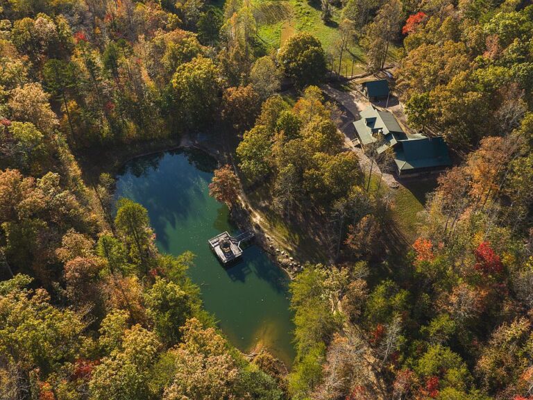 Private lake and 588 acres! Stunning log lodge in Tennessee. $3,000,000.