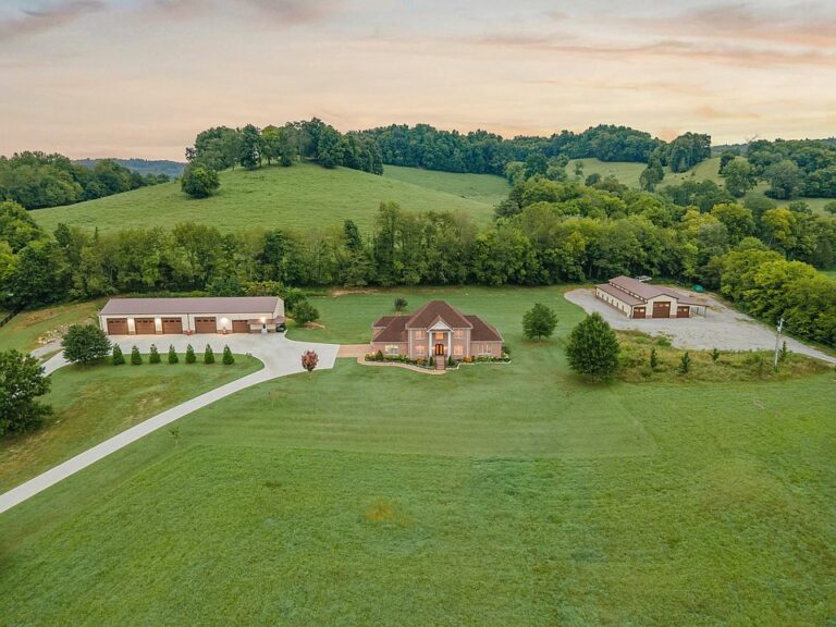 Check out the workshop!! 22 flat acres and a car collector’s dream in Tennessee. $1,950,000.