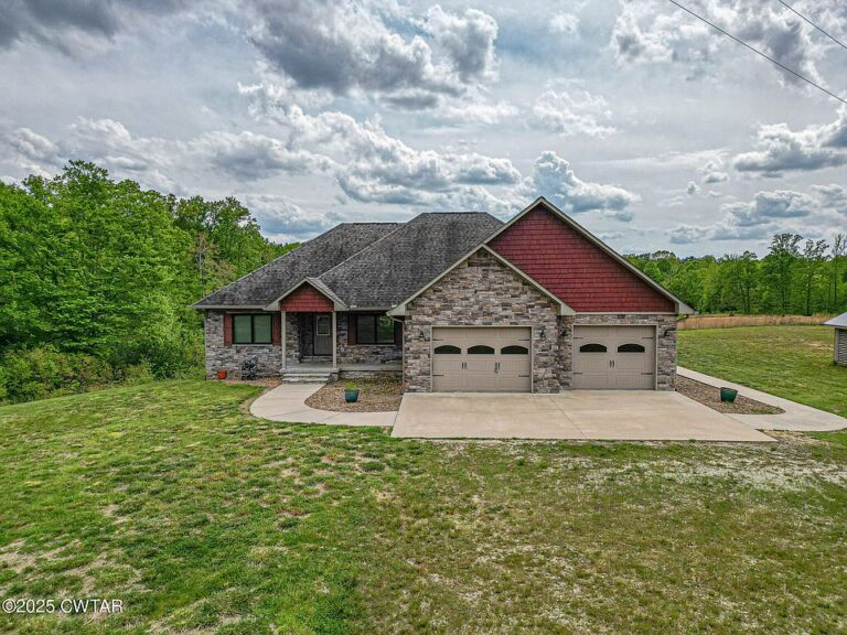 Beautiful heated floors! Over 4,000 sq. ft. in Hollow Rock. $815,000.