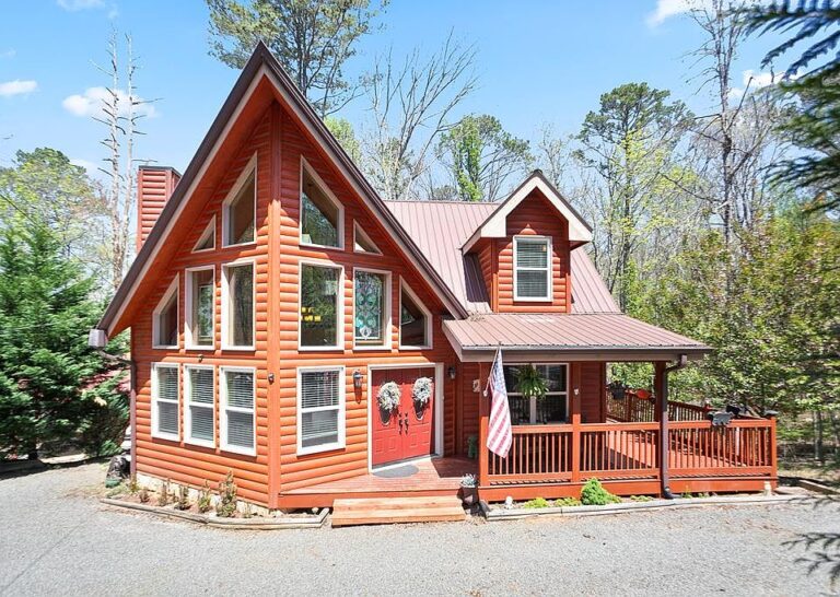 Beautiful woodwork! Finished terrace level and resort perks in GA. $545,900.