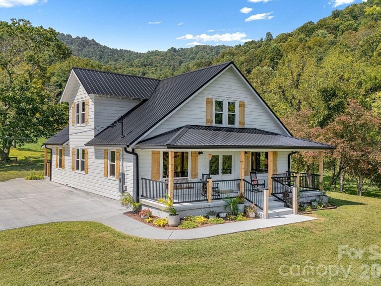 Pretty wood floors and 7 bedrooms! Incredible modern farmhouse in NC. $799,000.