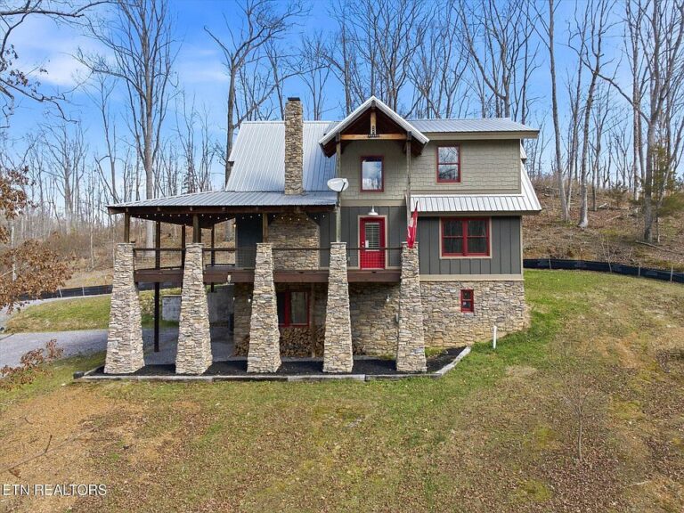 Check out those views! Private wooded acreage and rustic charm in TN. $740,000.