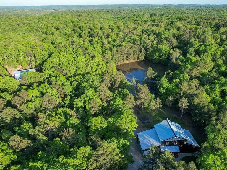 Check out the barn! Modern living on 15+ wooded acres. $623,500.