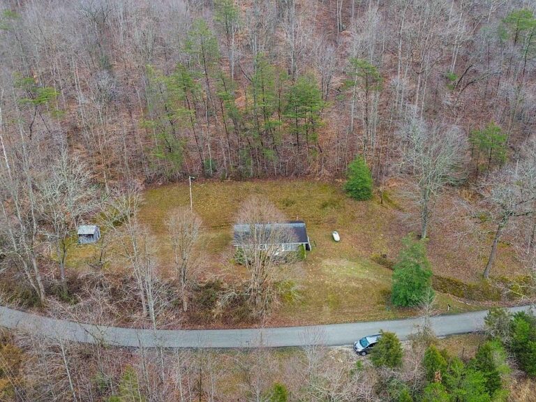 Pretty setting and mountain air! Over 65 scenic acres in KY. $725,000.