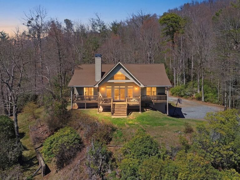 Check out that rock fireplace! Rustic charm in Clayton. $535,000.