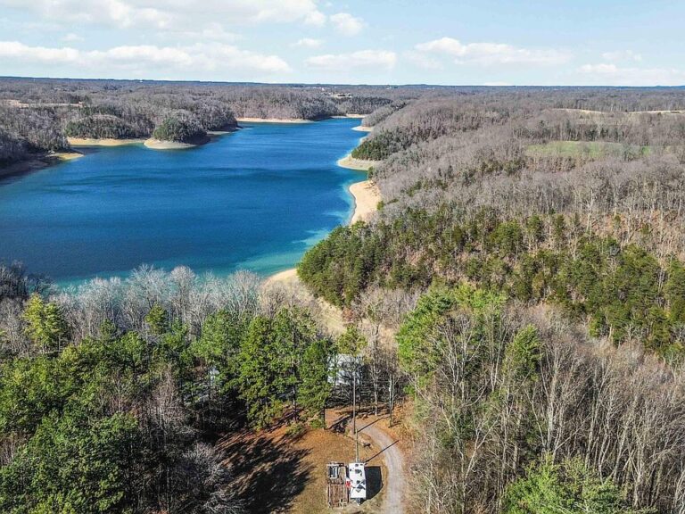 Check out the lake views!! 5 bedrooms on 2.7 wooded acres in Kentucky. $265,000.