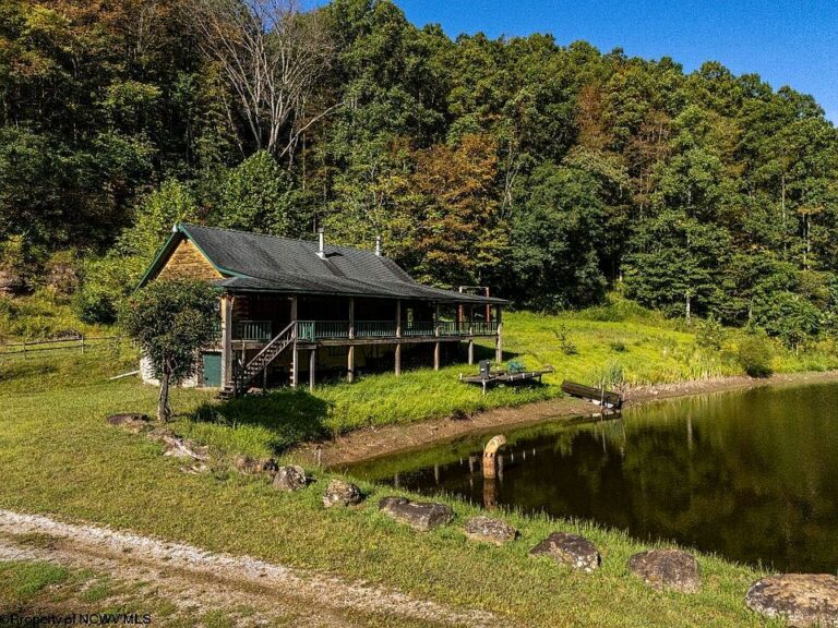Beautiful log cabin! Great wraparound porch! C. 2012 in West Virginia. $340,000.