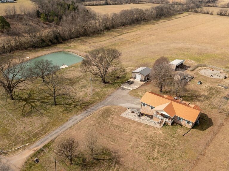 Beautiful brick ranch! C. 1986 on 15 acres in TN. $350,000.