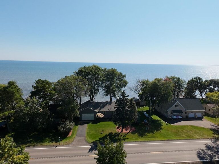 Sugar sand beach! Move-in ready with 7 acres in Minnesota. $635,000.