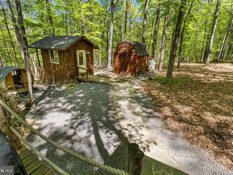 Check out the porch!! Live trees and mountain views in West Virginia. $294,999.