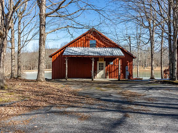 Pretty lake and lodge floors! 37 breathtaking acres in Tennessee. $899,000.