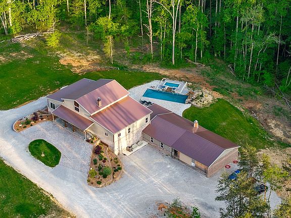 Beautiful woodwork! Great firepit spot! Over two acres in GA. $1,399,000.