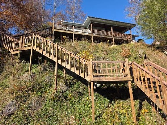 Riverfront Diamond! Rustic ranch on the Notla River in North Carolina. $240,000.