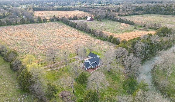 A mile of creek frontage! 105 sprawling acres in Tennessee. $1,699,999.