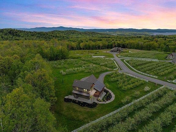 Pretty mountain views and Miele kitchen! 9.73 private acres in NH. $2,350,000.