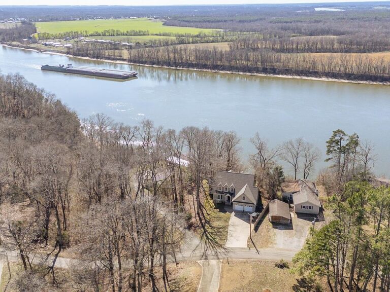 Stunning open concept! C. 1981 on the Tennessee River. $349,900.
