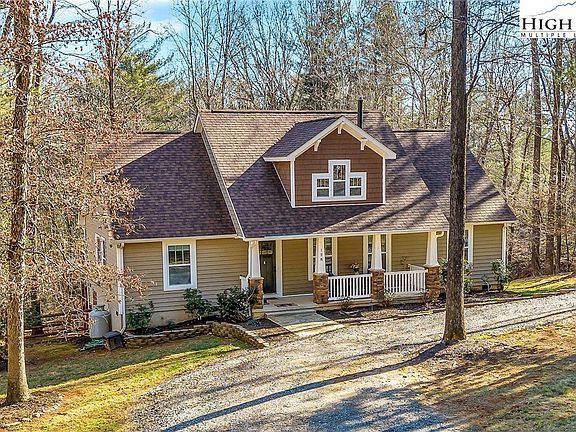 Riverfront paradise and two homes! Over 7 acres in NC. $499,998.