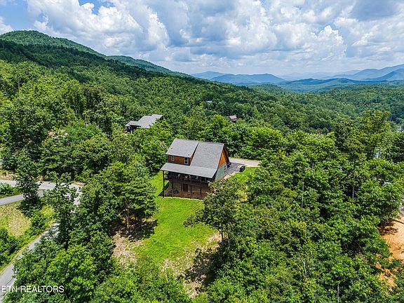 Check out those decks!! Luxury rental-ready retreat in Tennessee. $850,000.
