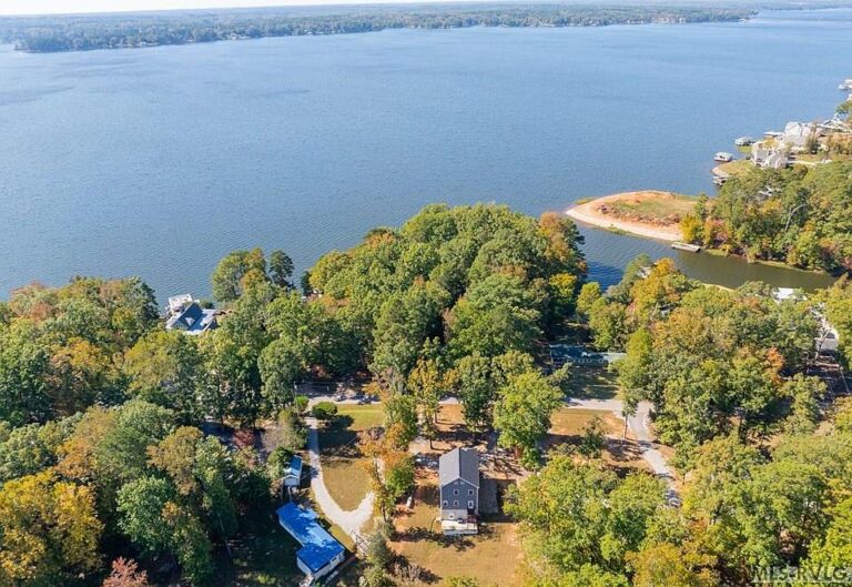 Check out the deck!! Brand new stainless appliances and lake vibes in NC. $395,000.