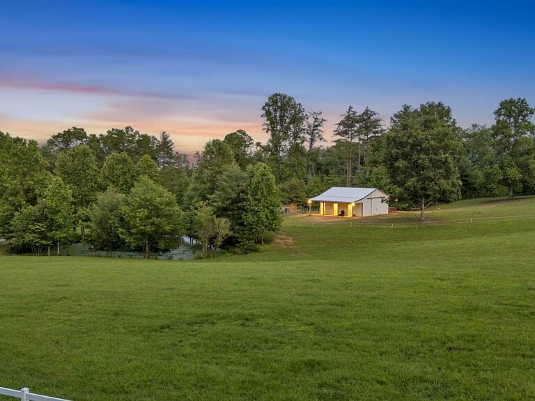 Check out that wrap-around porch!! 107 private equestrian acres in Tennessee. $1,762,000.