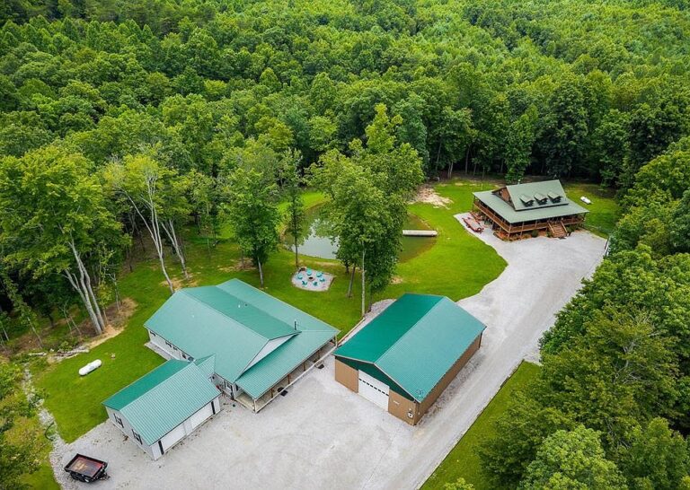 Pretty mountain views and trails! Two site-built homes on 16 acres. $1,225,000.