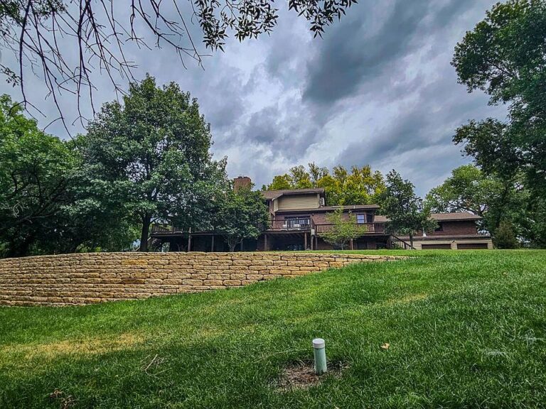 Great family getaway! 5-bedroom brick home on 36 acres in KS. $695,000.