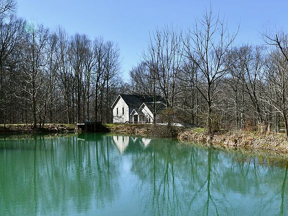 Your own private pond and woods! 3 serene acres in Indiana. $374,900.