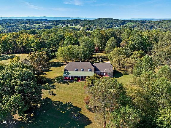 Check out that fireplace!! Over 5 acres of privacy in Tennessee. $1,049,000.