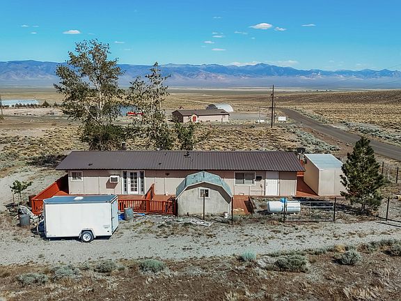 Check out the wood stove! High ceilings and desert views in Nevada. $199,900.