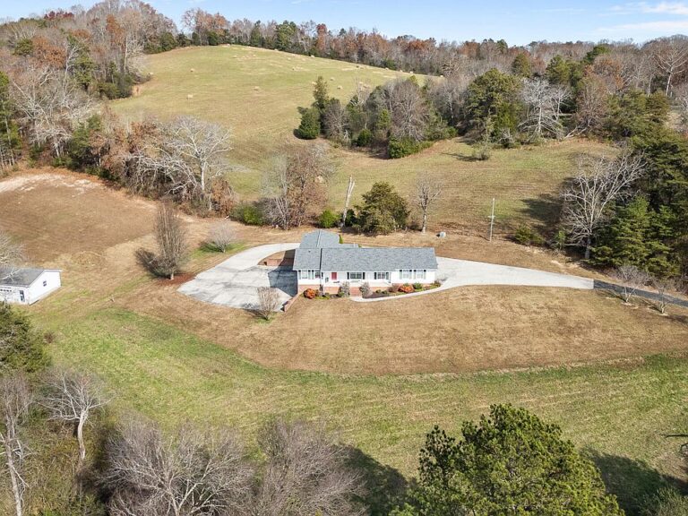 Huge workshop and barn! C. 1999 on 43+ acres in TN. $1,350,000.