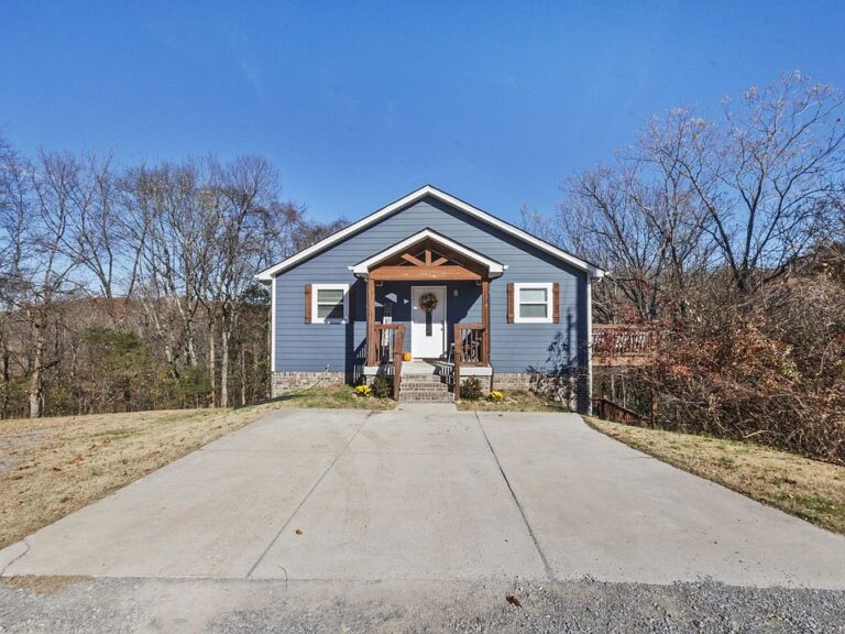 Unbelievable views and 3 homes! Over 12 acres in Tennessee. $2,690,000.